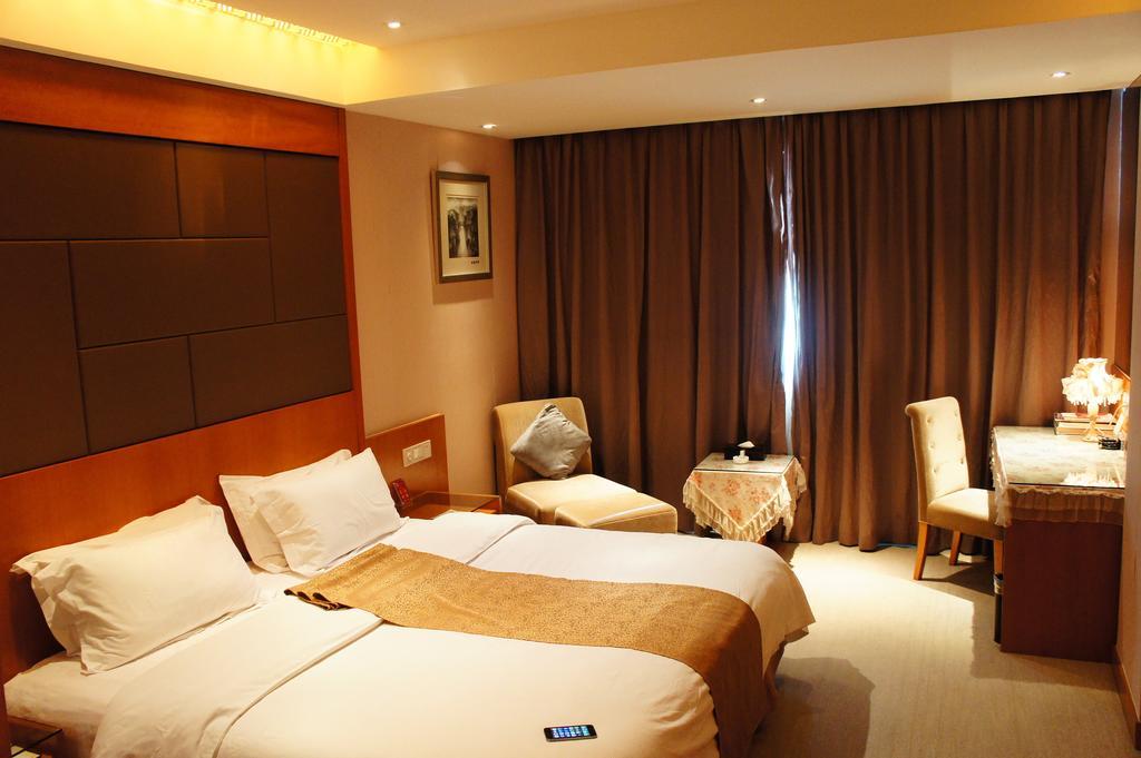 Oriental Hotel Tong Xiang Jiaxing Zimmer foto