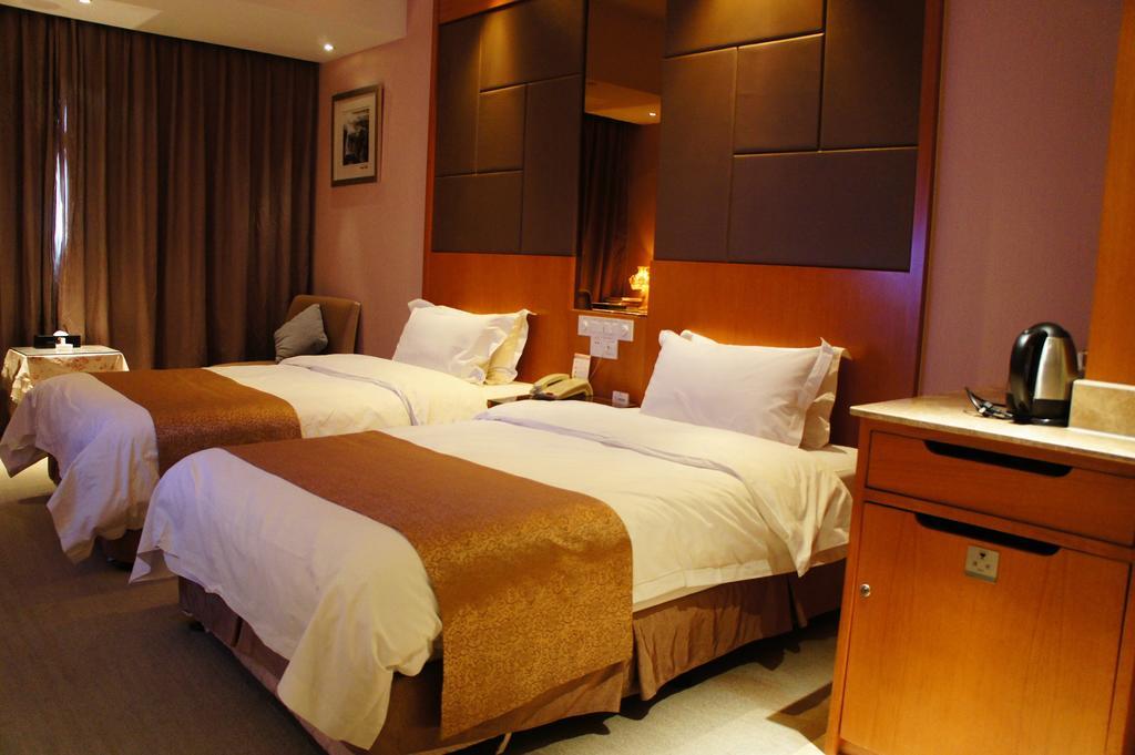 Oriental Hotel Tong Xiang Jiaxing Zimmer foto