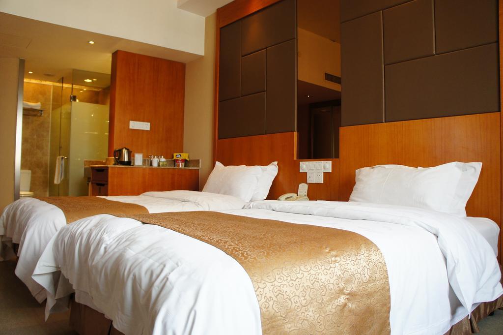 Oriental Hotel Tong Xiang Jiaxing Zimmer foto