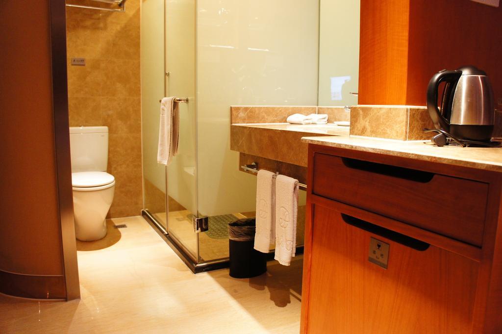 Oriental Hotel Tong Xiang Jiaxing Zimmer foto