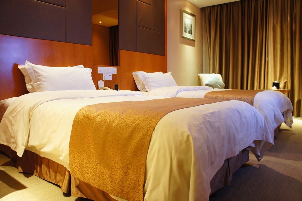 Oriental Hotel Tong Xiang Jiaxing Zimmer foto